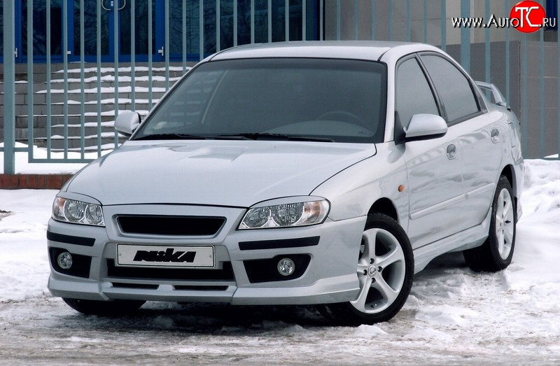 7 699 р. Передний бампер Nika Sport KIA Spectra (2000-2009) (Без вставок под ПТФ, Неокрашенный)  с доставкой в г. Самара